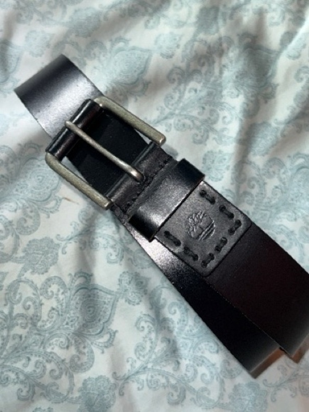 Timberland Black Leather Belt with Embossed Logo and Metal Buckle